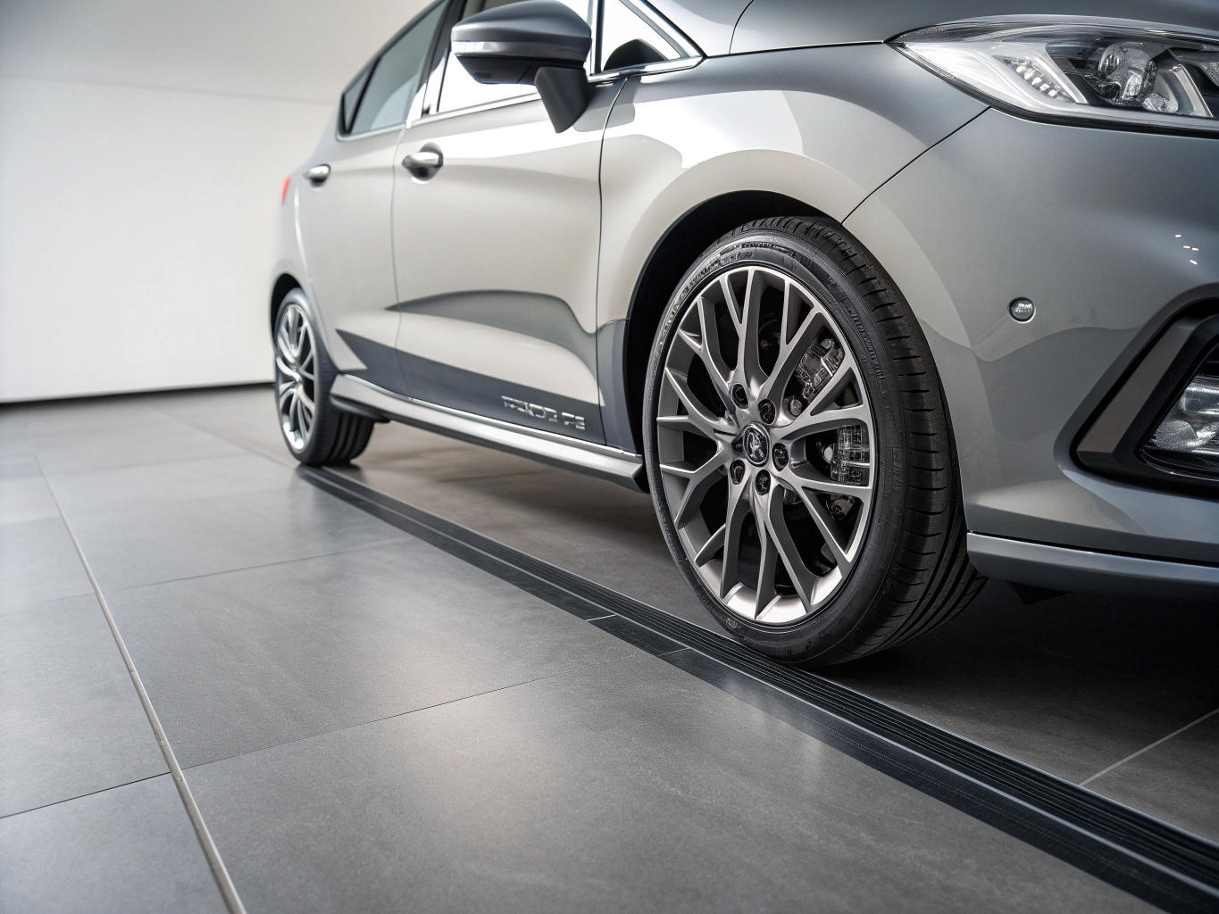 Refurbished used vehicles photographed in a clean indoor automotive showroom